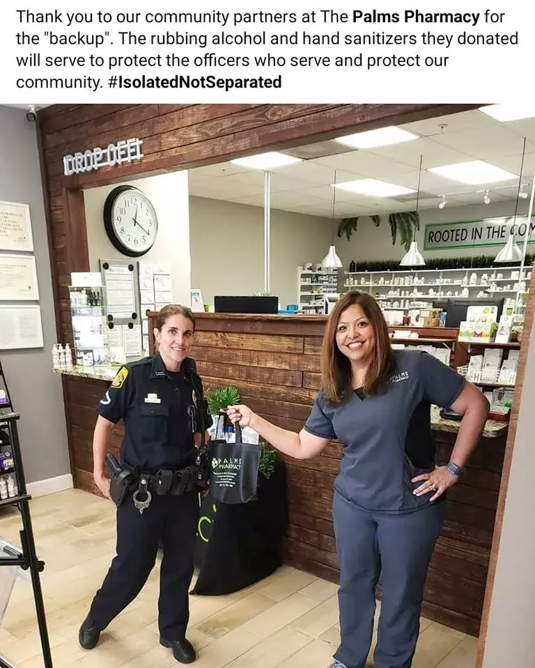 pharmacist with police officer